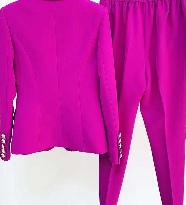 Purple suit jacket and pants on a white background