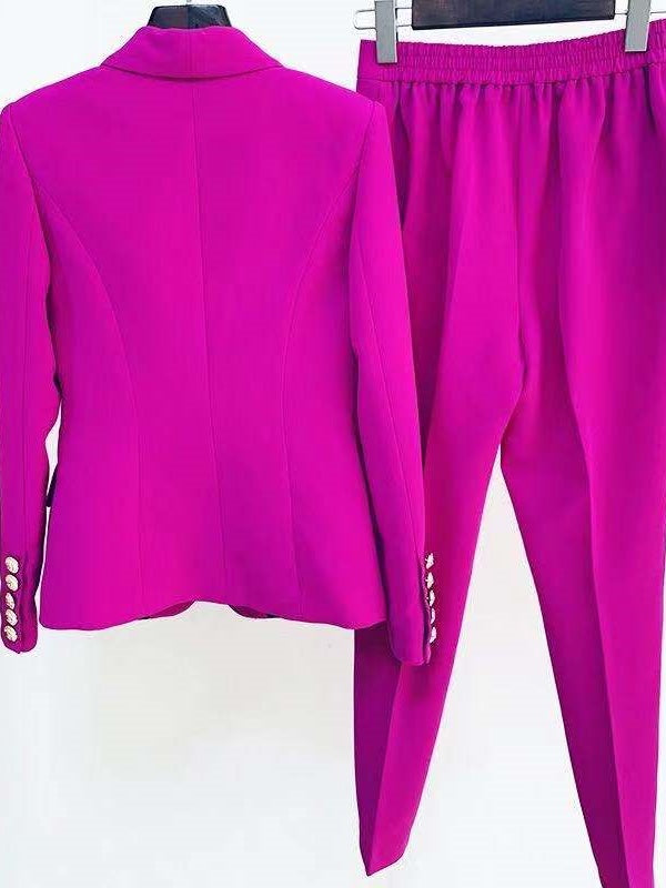 Purple suit jacket and pants on a white background