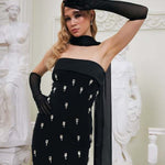 Elegant black strapless dress with matching gloves