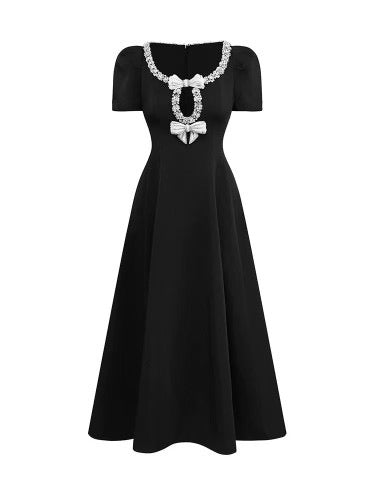 Vintage black dress with jeweled bow details